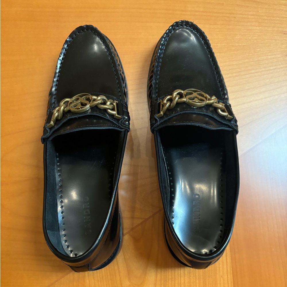 Sandro women’s black leather loafer.